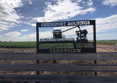 A sign displaying the name "Gredgport Holdings" prominently in clear, bold letters against a neutral background.