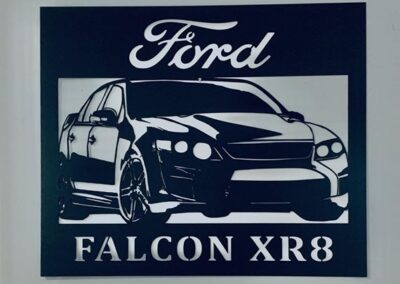 A customized ford falcon XR8 wooden art