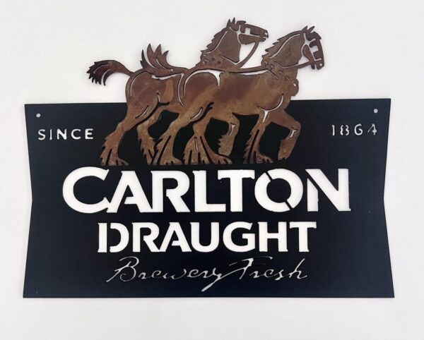 Metallic sign for Carlton Draught beer featuring horses and brand name since 1864.