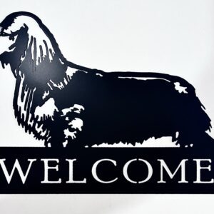 Silhouette of a dog above a "WELCOME" sign.