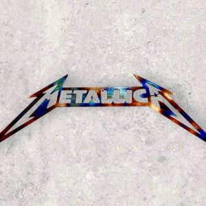 Metallica band logo with iconic font and lightning bolt on concrete background.