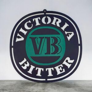 A circular Victoria Bitter (VB) beer logo sign with white text on a green and black background.