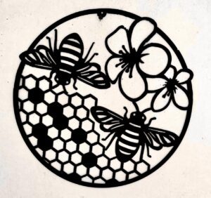 Black silhouette of bees and flowers over honeycomb pattern inside a circle.