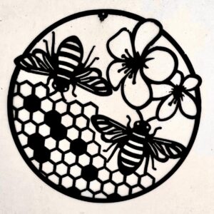 Black silhouette of bees and flowers over honeycomb pattern inside a circle.