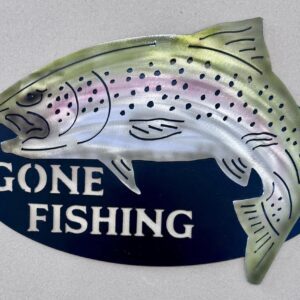 Metallic fish-shaped sign with "GONE FISHING" text on a navy blue background.