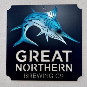 Metal sign for Great Northern Brewing Co. with a blue marlin silhouette.