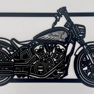 Black metal silhouette of a motorcycle on a white background.