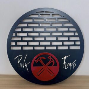 Round metal Pink Floyd decor featuring band's name and crossed hammer logo.