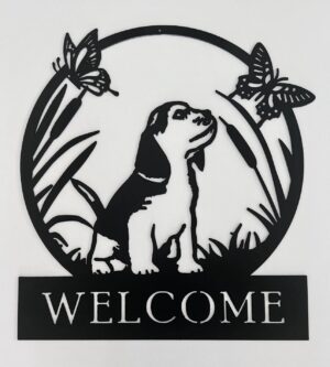 Black metal welcome sign with a dog and butterflies design.