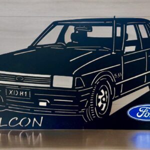 Silhouette of Ford Falcon car with logo on a stand.